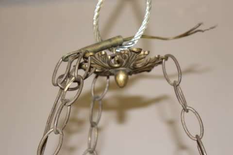 A fabulous, elegant brass and porcelain ceiling light/ chandelier. Amazing in formal living areas!!!