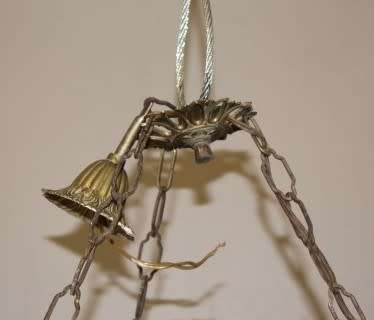 A gorgeous, elegant brass and ceramic ceiling light/ chandelier.  Lifespace Sale