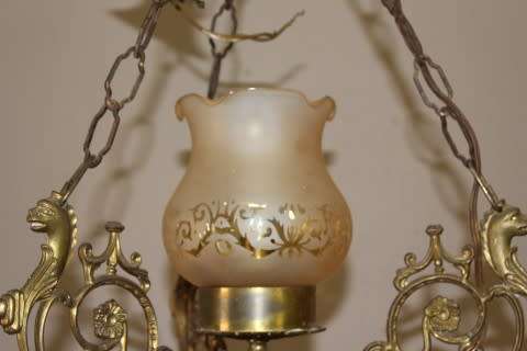 A gorgeous, elegant brass and ceramic ceiling light/ chandelier.  Lifespace Sale