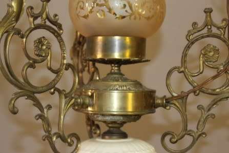 A gorgeous, elegant brass and ceramic ceiling light/ chandelier.  Lifespace Sale