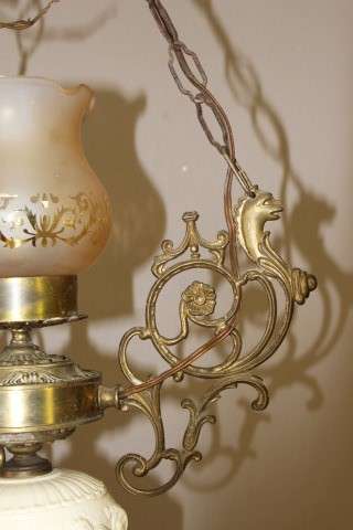A gorgeous, elegant brass and ceramic ceiling light/ chandelier.  Lifespace Sale