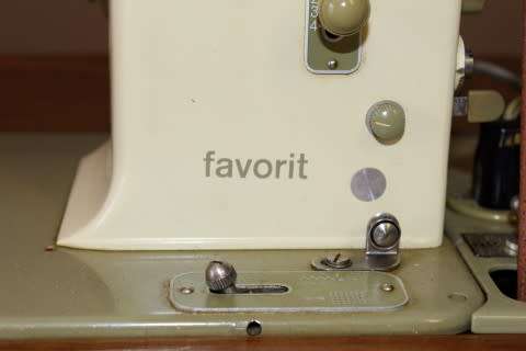 Stunning vintage Bernina "Favorit" 1959 treadle sewing machine in its original cabinet.