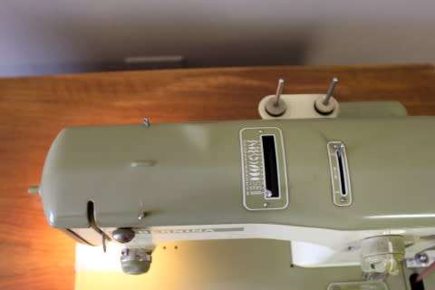 Stunning vintage Bernina "Favorit" 1959 treadle sewing machine in its original cabinet.