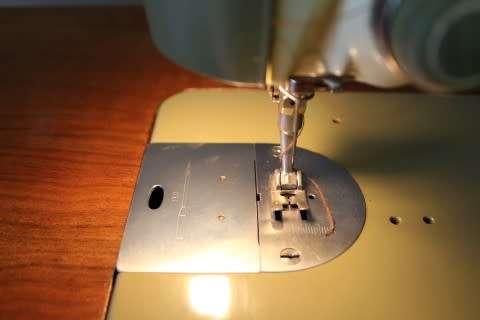 Stunning vintage Bernina "Favorit" 1959 treadle sewing machine in its original cabinet.