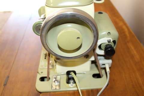 Stunning vintage Bernina "Favorit" 1959 treadle sewing machine in its original cabinet.