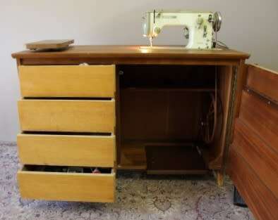 Stunning vintage Bernina "Favorit" 1959 treadle sewing machine in its original cabinet.