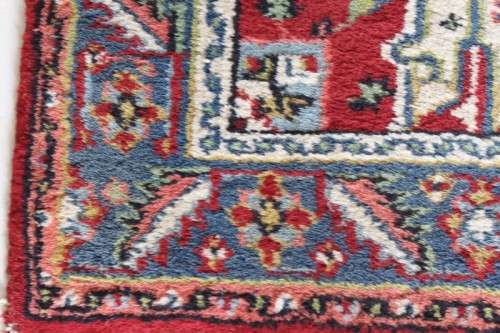 A stunning 95cm x 153cm hand knotted thick pile Persian carpet in dark reds. Gorgeous in all rooms!
