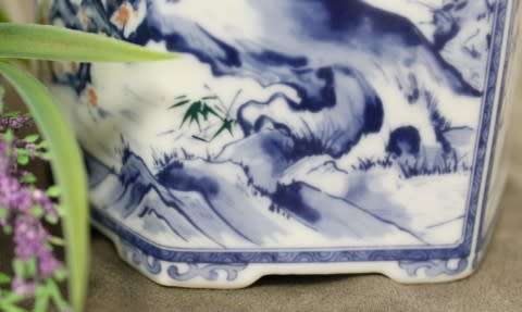 A mod porcelain Chinese Ginger jar with detailed paintings and patterns, with a lid. Lifespace Sale