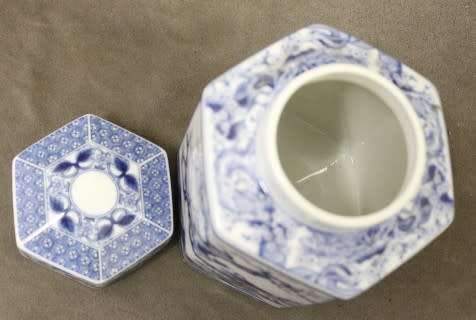 A mod porcelain Chinese Ginger jar with detailed paintings and patterns, with a lid. Lifespace Sale