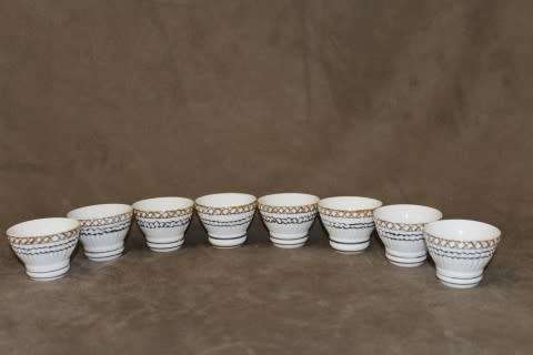 A very pretty traditional Chinese rice wine set of 8 cups with silver and gold gilt.