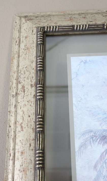 A beautifully composed print of a palm tree framed between glass in a mod wood frame Lifespace Sale