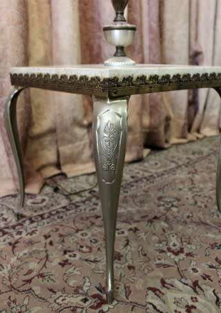 A beautiful decorative marble and brass free standing floor lamp with a large shade.