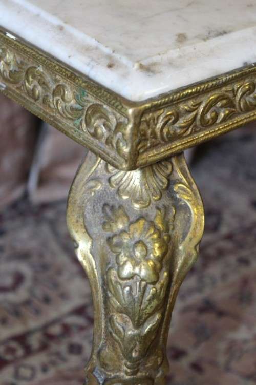 A lovely vintage marble and brass telephone table w/ a cushion, great in informal rooms!