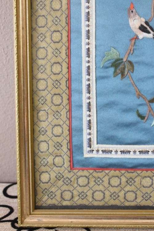 A beautiful vintage Japanese themed embroided on silk picture of a bird with flowers.