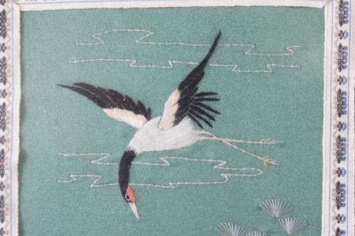 A beautiful vintage Japanese themed embroided on silk picture of a birds.