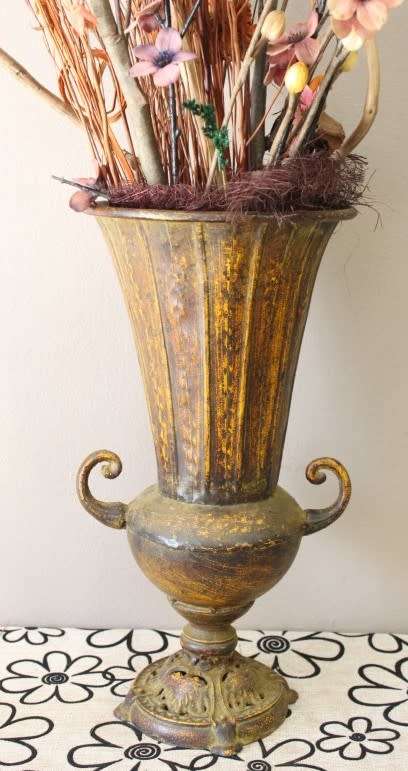 A beautiful large vintage decorative vase with lovely dried flowers.