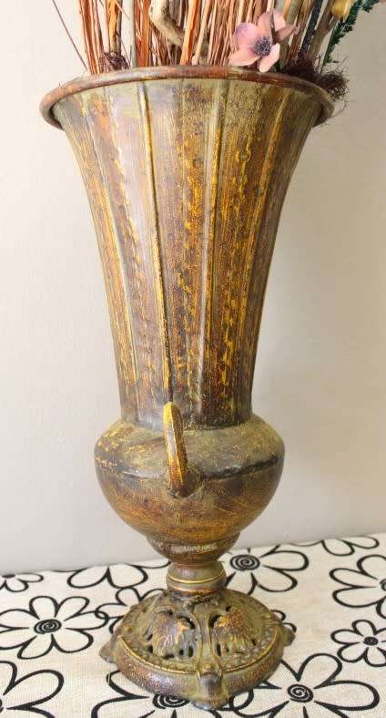 A beautiful large vintage decorative vase with lovely dried flowers.