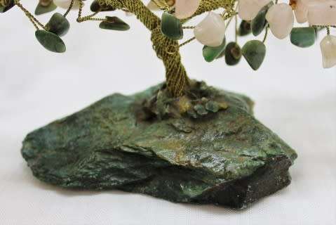 A stunning moonstone & adventurine gemstone and brass tree on a green quartz base.