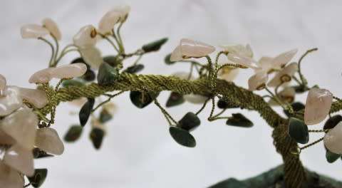 A stunning moonstone & adventurine gemstone and brass tree on a green quartz base.