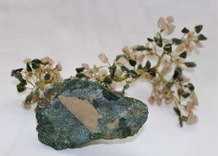 A stunning moonstone & adventurine gemstone and brass tree on a green quartz base.