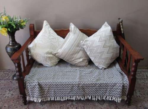 A wonderful well-made, sturdy vintage 2 seater Teak wood bench on castors, perfect  in a lapa/ patio