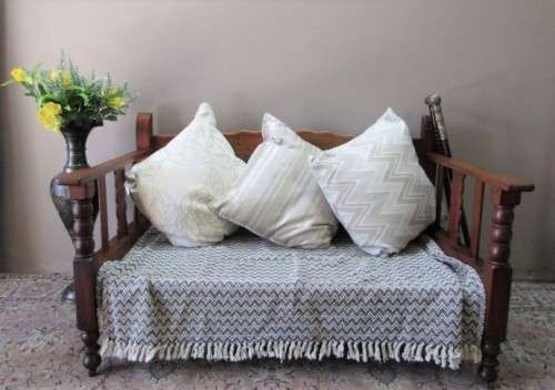 A wonderful well-made, sturdy vintage 2 seater Teak wood bench on castors, perfect  in a lapa/ patio