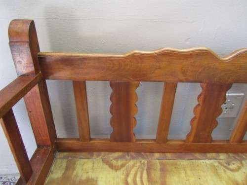 A wonderful well-made, sturdy vintage 2 seater Teak wood bench on castors, perfect  in a lapa/ patio