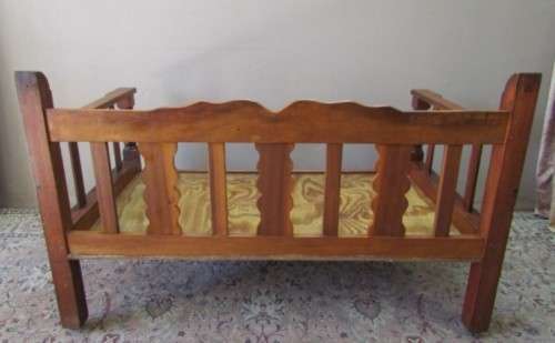 A wonderful well-made, sturdy vintage 2 seater Teak wood bench on castors, perfect  in a lapa/ patio