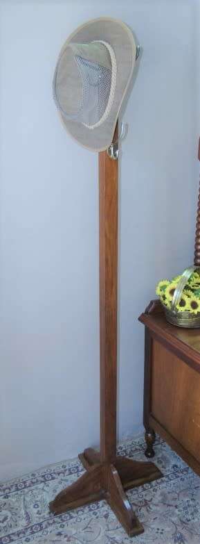 A stunning free standing Teak coat/ hat rack in good condition.Perfect in an entrance, hallway.