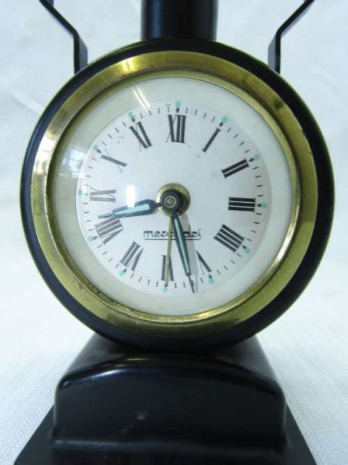 A gorgeous vintage mini Mercedes black metal wind up clock, working. Lifespace Sale