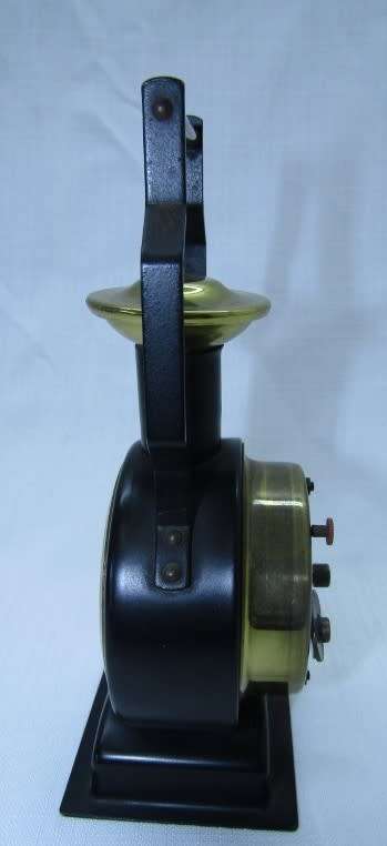 A gorgeous vintage mini Mercedes black metal wind up clock, working. Lifespace Sale