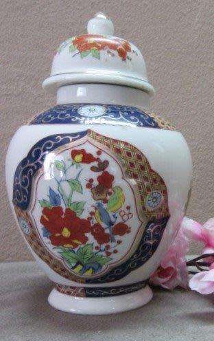 A beautiful, colorful Chinese lidded Ginger jar . Gorgeous on display!!
