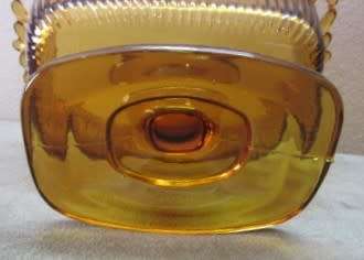 Two lovely lidded coloured glass butter dishes, gorgeous on a breakfast table!