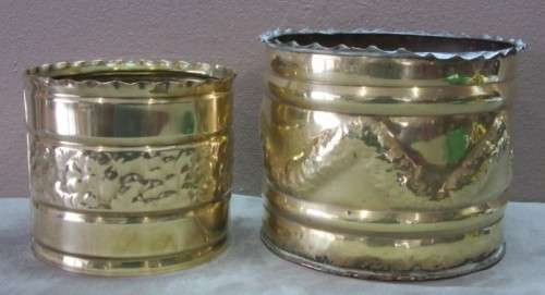 A lovely pair of solid brass pot plant holders with punched detailing.  Lifespace Sale