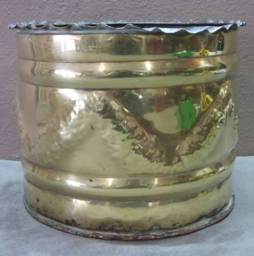 A lovely pair of solid brass pot plant holders with punched detailing.  Lifespace Sale