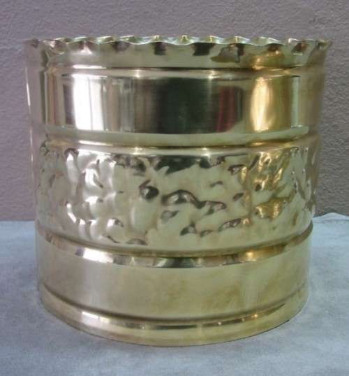 A lovely pair of solid brass pot plant holders with punched detailing.  Lifespace Sale