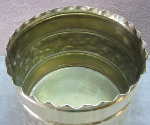 A lovely pair of solid brass pot plant holders with punched detailing.  Lifespace Sale