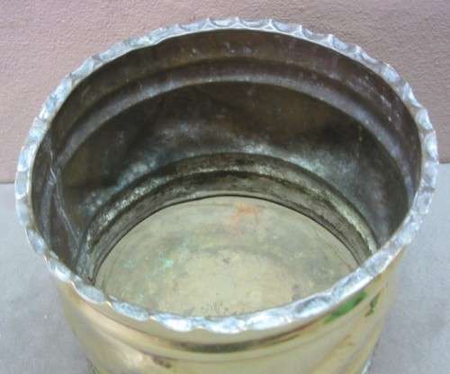 A lovely pair of solid brass pot plant holders with punched detailing.  Lifespace Sale