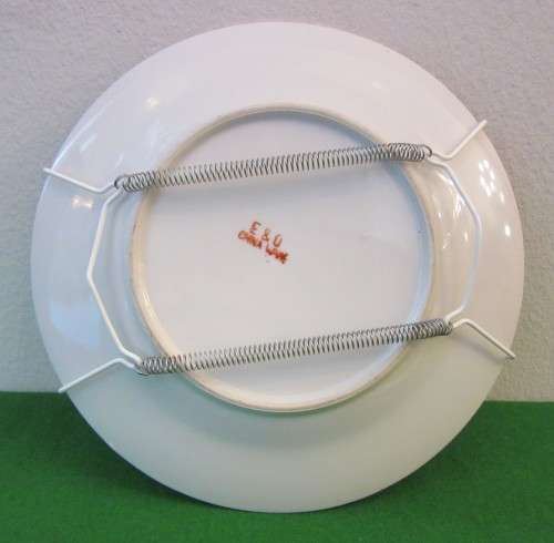 A decorative E&O China Wave display wall plate with raised dragons!