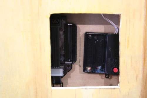 A beautiful Oak and brass battery operated chiming (speaker) wall clock, working. Lifespace Sale