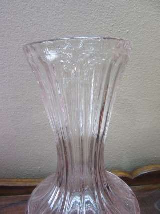 A stunning, eye catching pink glass vase!! Beautiful on display!! Lifespace Sale