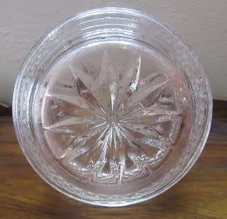 A stunning, eye catching pink glass vase!! Beautiful on display!! Lifespace Sale