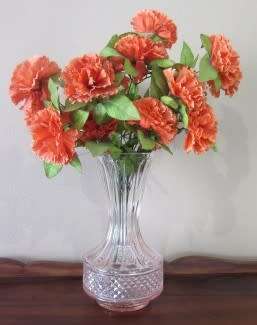 A stunning, eye catching pink glass vase!! Beautiful on display!! Lifespace Sale