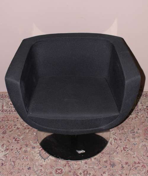 A stylish & modern pair of sleek, retro-styled black arm chairs, with thick durable fabric.