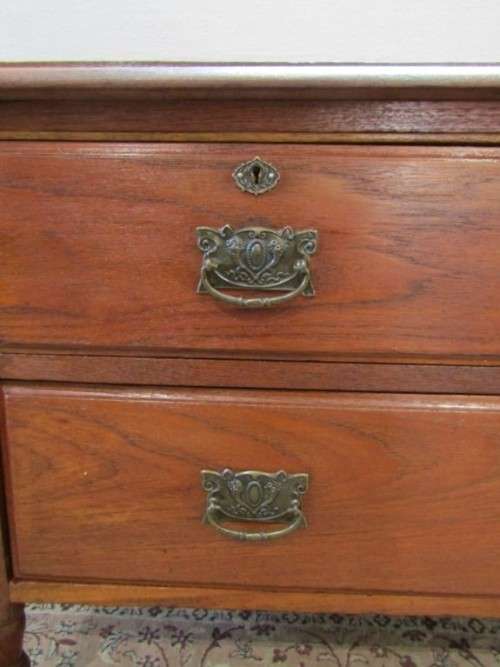 An amazing vintage Oak dressing table with three drawers and original castors. Stunning!!