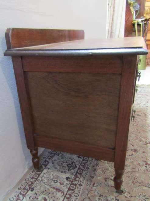 An amazing vintage Oak dressing table with three drawers and original castors. Stunning!!