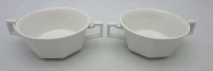 A lovely pair of white porcelain double handled soup bowls.  Lifespace Sale