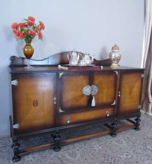 A large Victorian buffet/ side server cabinet w/ drawers, shelves, wine holder-Lifespace Sale