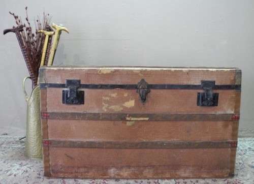 A fabulous large vintage travel trunk perfect for extra storage/ fashionable rustic coffee table!!