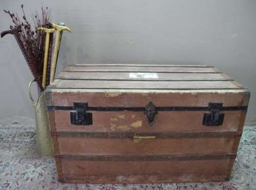 A fabulous large vintage travel trunk perfect for extra storage/ fashionable rustic coffee table!!
